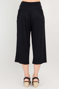 Rear view of black Gaylene capri pants with palazzo leg