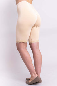 Angled back view of Rubia bamboo undershort in beige highlighting lace trim