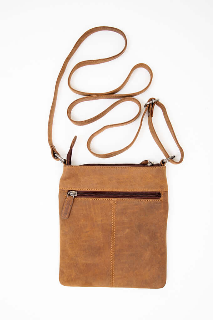 Rustic brown leather crossbody pouch with long adjustable strap and front zip pocket