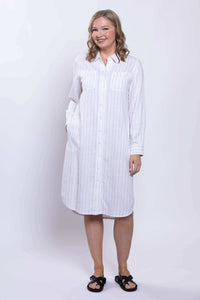 Side-angle front view of a model in a striped viscose linen long duster dress