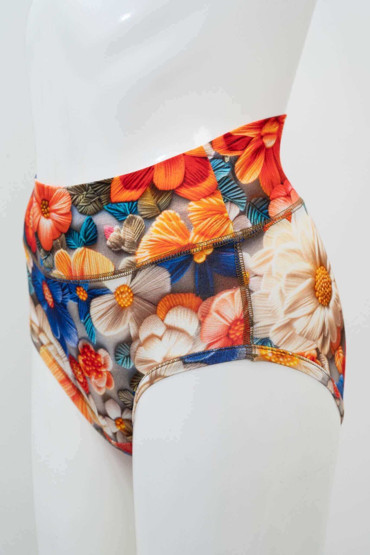 Side view of high waist floral print brief displayed on mannequin