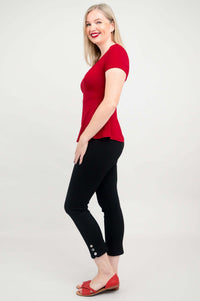 Side profile of woman wearing Kim Cap bamboo top in cherry red
