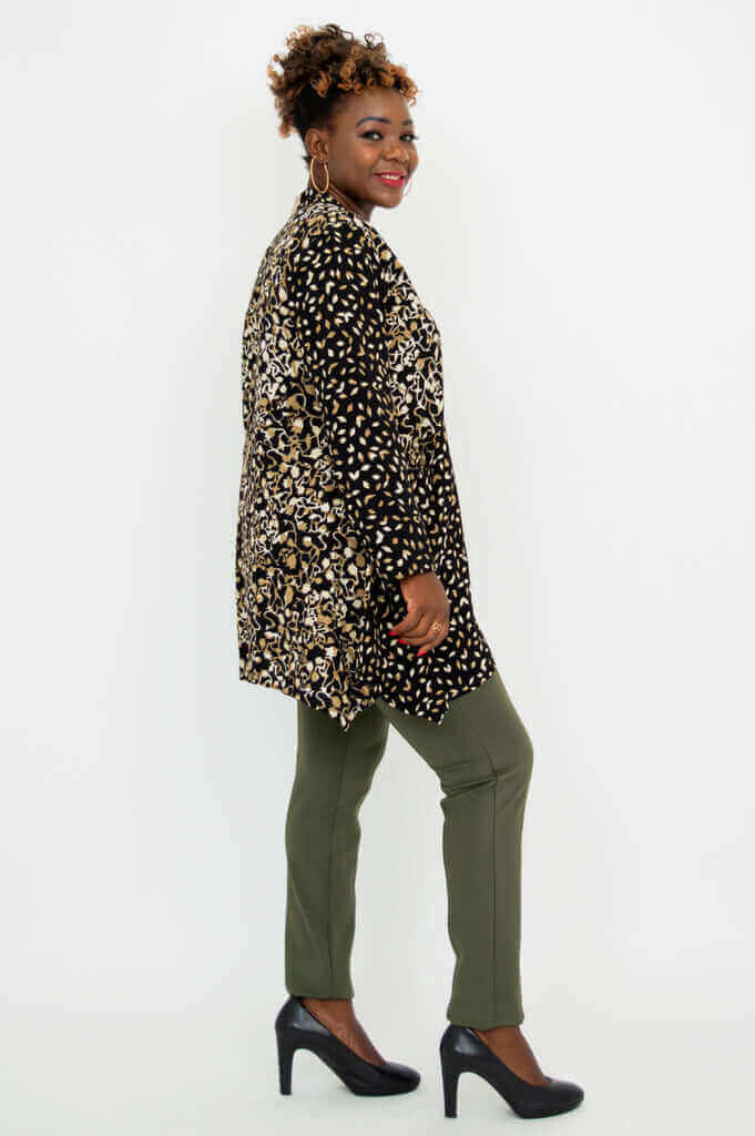 Side view of model in Laney Blouse – Black Gold Abstract
