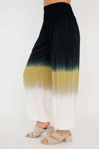 Side view of Embra ombre pants showing loose fit and color fade