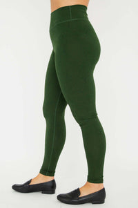 Side view of Riley green leggings, showing profile and seam detail