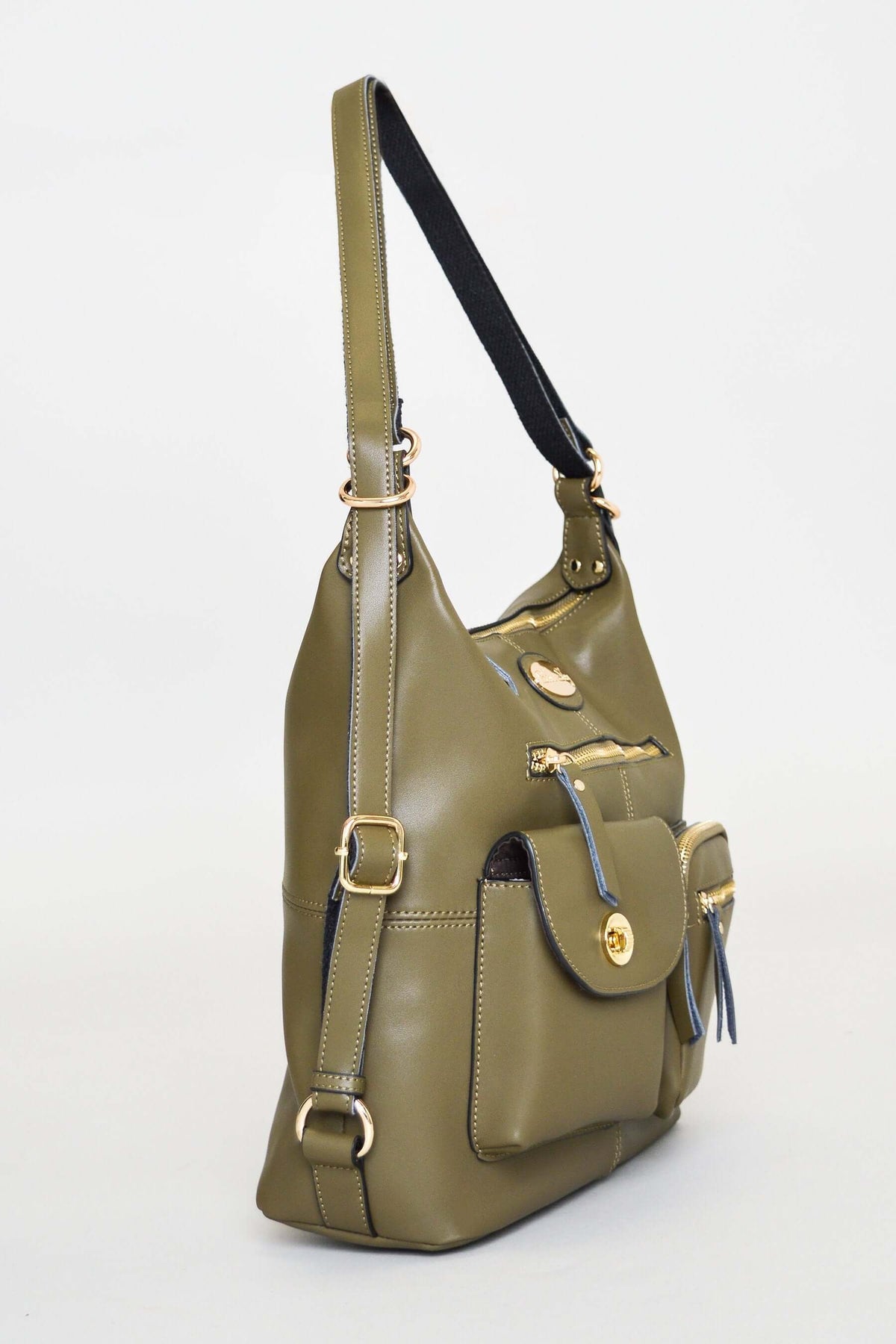 Side angle of olive green organizer bag highlighting front pockets and strap detail