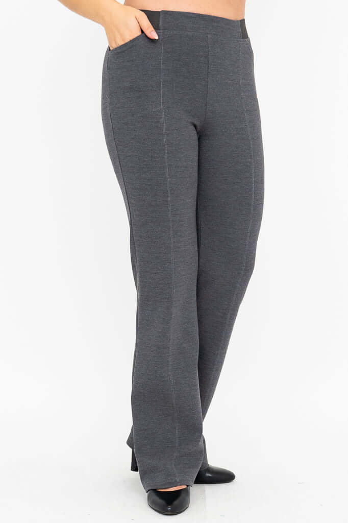 Side view of granite grey flare pants showing pocket and relaxed leg