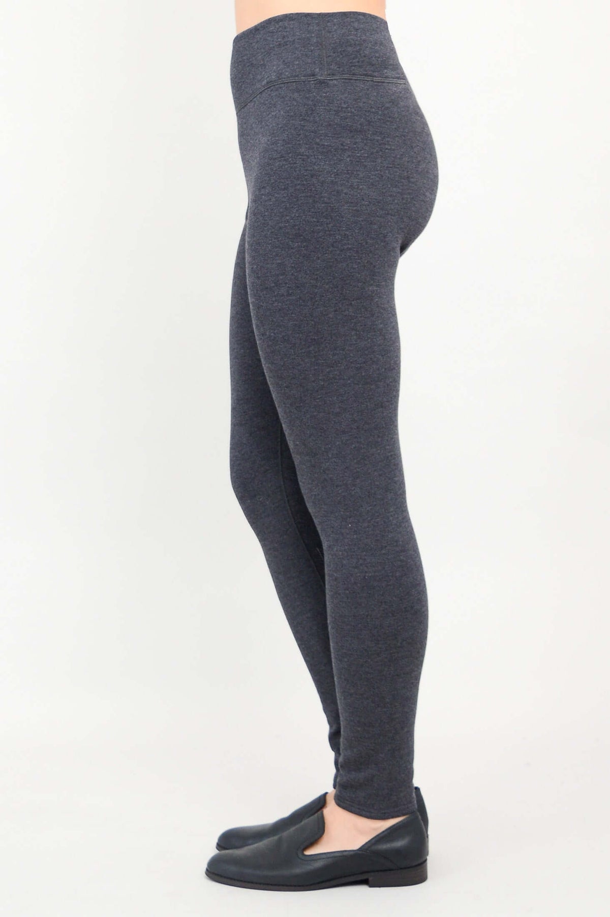 Side view of Dixie Fleece-Lined charcoal leggings showing fit and stretch