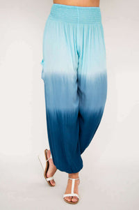 Side view of Embra ombre blue pants with relaxed fit and gathered waist