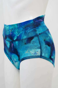 Side view of blue high waist bamboo brief showing waistband and fabric detail