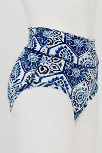 Side view of blue mosaic patterned high-waist brief on mannequin