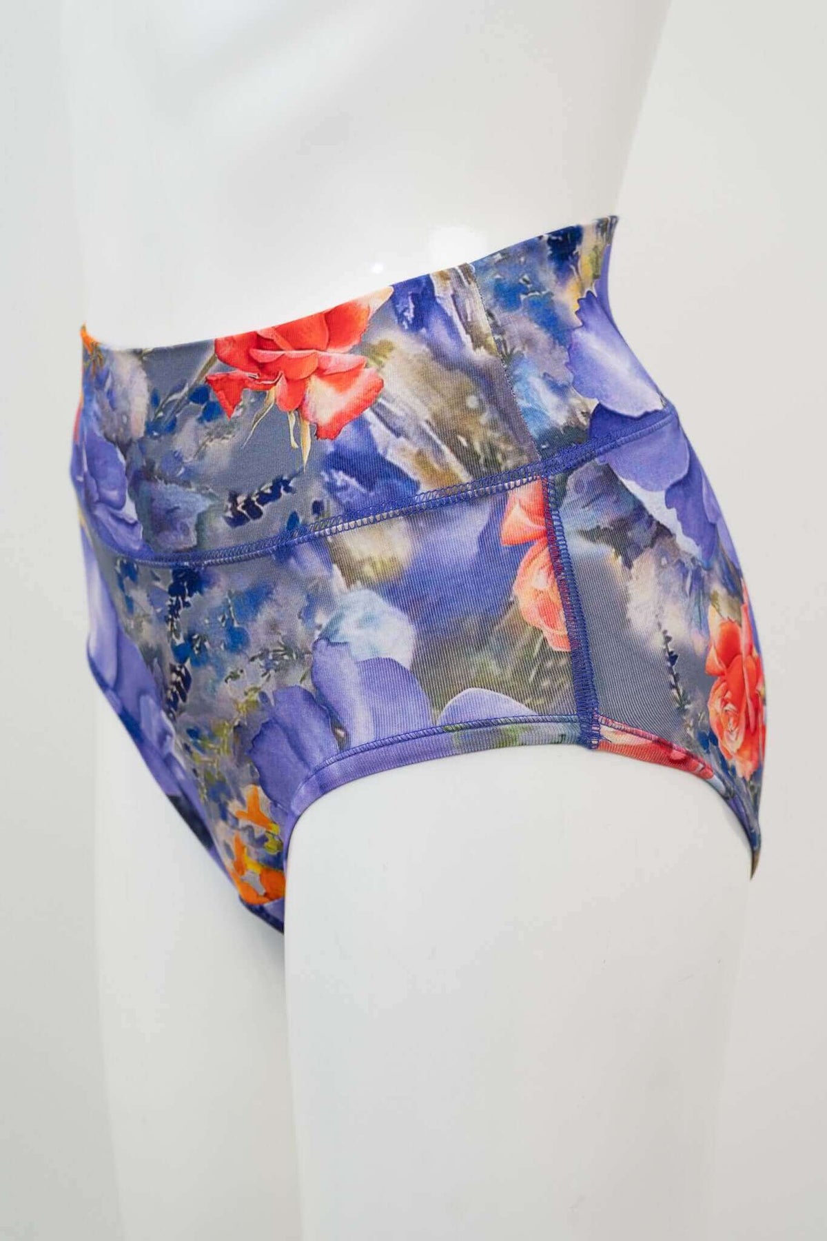 Side view of high-waist brief showing seamless floral print on mannequin