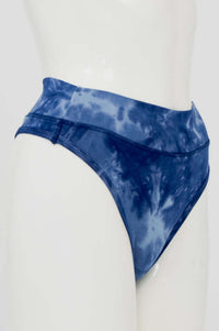 Side view of indigo bamboo high rise thong underwear showing waistband and fit
