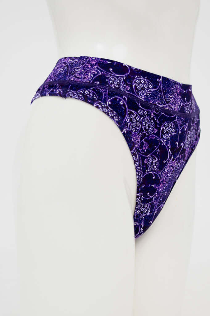 Side view of purple bamboo thong underwear showing high rise fit and detailed design