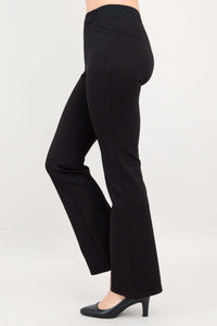 Side view showing the slim fit and flare design of black modal pants