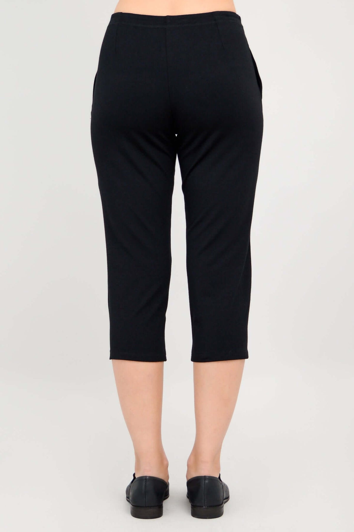 Back view close-up of Susan Capri black pants