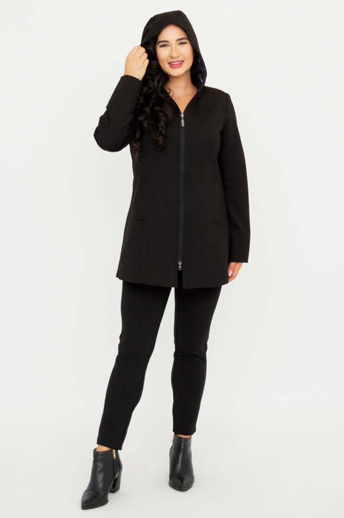 Model wearing The Highlands Coat with hood up