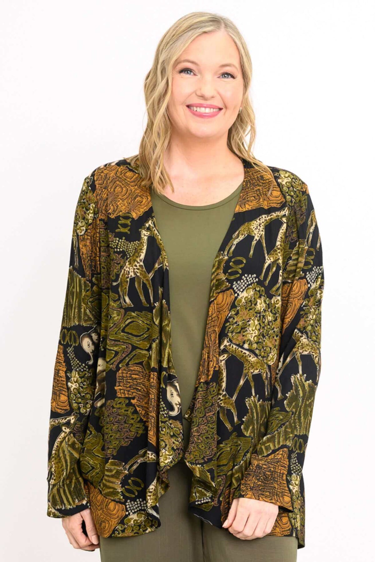 Woman wearing the Toucan Jacket with animal print and flowy hemline, shown in a close-up view