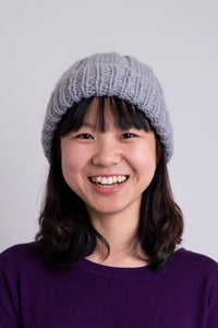 Women's grey knit toque wool beanie hat.