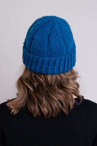 Women's teal blue toque wool beanie hat.