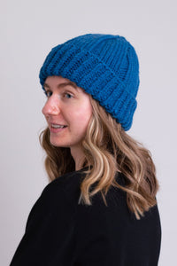 Women's teal blue toque wool beanie hat.