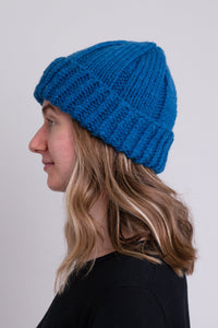 Women's teal blue toque wool beanie hat.